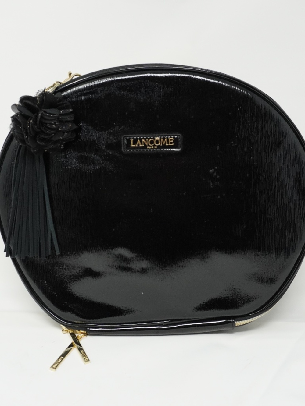 Lancôme Le Parisian Cosmetic Faux Leather Train Case in black. 